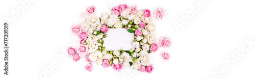 Blank note paper decorated flowers frame, white and pink roses © photopixel