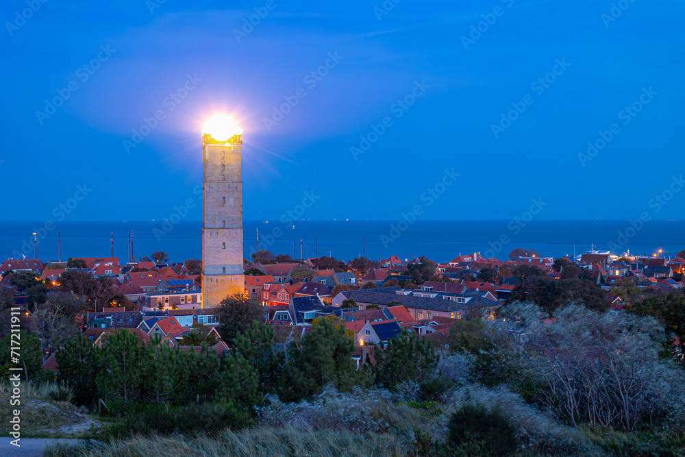 Small town in West-Terschelling in evening, Brandaris lighthouse (Vuurtoren Brandaris) on the Dutch Wadden Sea island Terschelling, A municipality and an island in the northern, Friesland, Netherlands