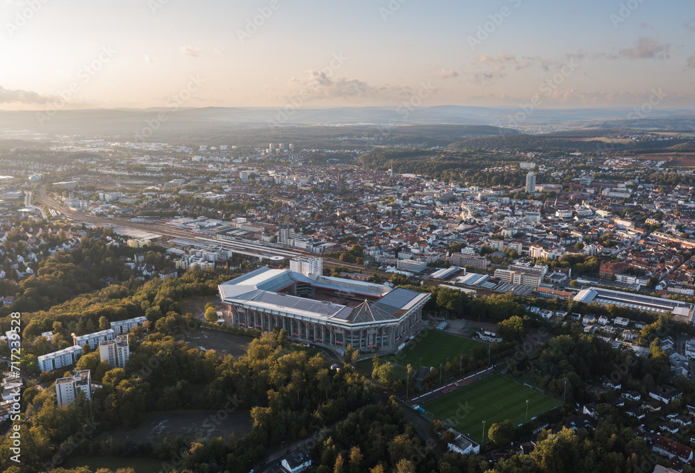 Aerial panoramic skyline cityscape of Kaiserslautern city and Fritz-Walter-Stadion, 1. FC Kaiserslautern stadium at sunset. Rhineland-palatinate, Germany