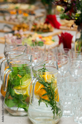 Jugs of drinks at the buffet table.