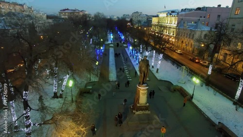 Monument of A.S.Griboedov on Chistoprudniy boulevard with citizens photo