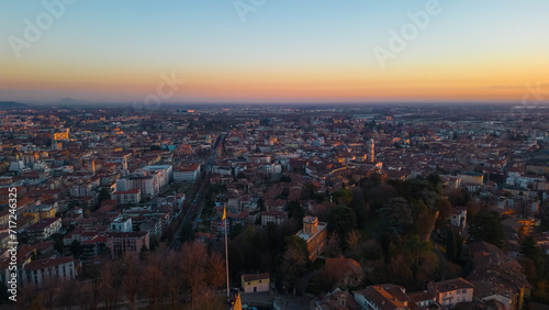Aerial view Citta Alta Bergamo, Italy. Drone aerial view of the old town during sunrise. Landscape at the city center, its historical buildings. 
