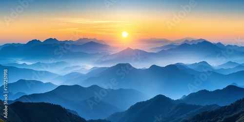 Sun Setting Over Beautiful Mountain Range