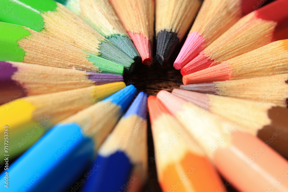 Macro photo of colored pencils together in a circle. Concept of desk tools. Macro photo of colored pencils together in a circle. Concept of desk tools.