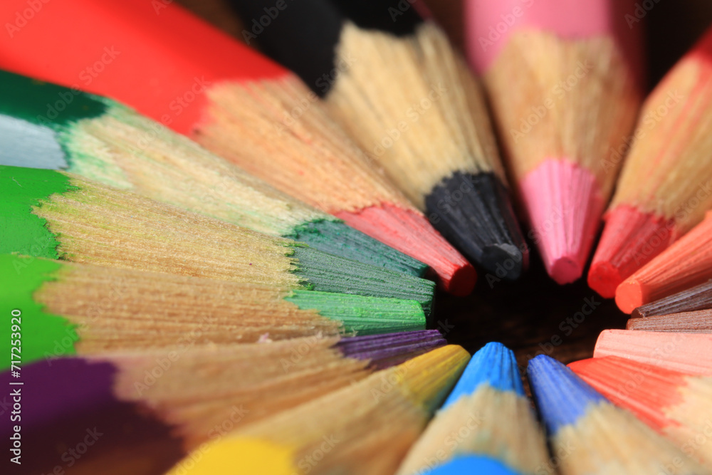 Macro photo of colored pencils together in a circle. Concept of desk tools. Macro photo of colored pencils together in a circle. Concept of desk tools.