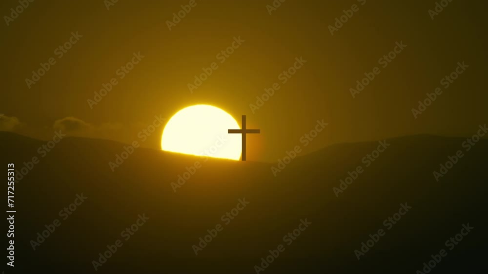 Sun going down a mountain where Jesus cross leads in silhouette Sun going down a mountain where Jesus cross leads in silhouette