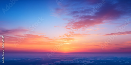 Abstract gradient sunrise in the sky with cloud and blue mix orange natural background. © ParinPIX