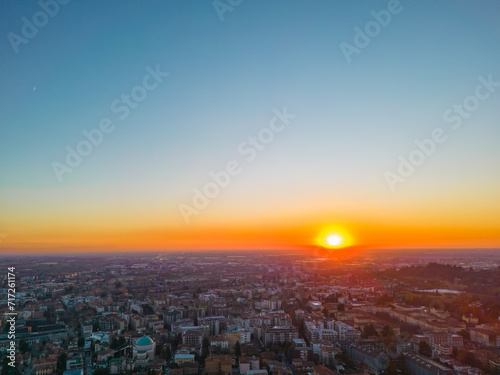 Beautiful sunset over the city of Bergamo in winter  Aerial view Bergamo. View from the top Bergamo Alta sunset. Italy  Lombardy  Bergamo. 