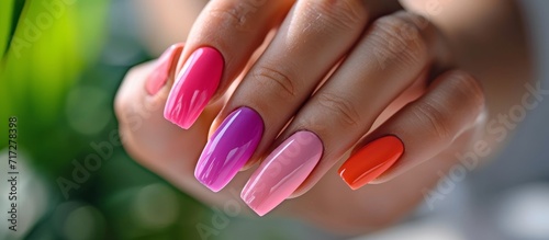Woman and girl can have healthy and attractive nails at a beauty salon. photo