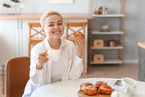 Young woman with cup of cof...