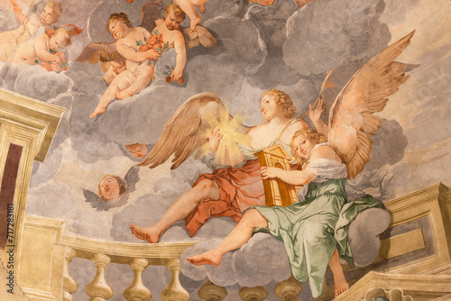 VICENZA, ITALY - NOVEMBER 6, 2023: The detail of angels from the fresco in the main apse in the chruch Basilica dei Santi Felice e Fortunato by Giulio Carpioni (1613 - 1678).