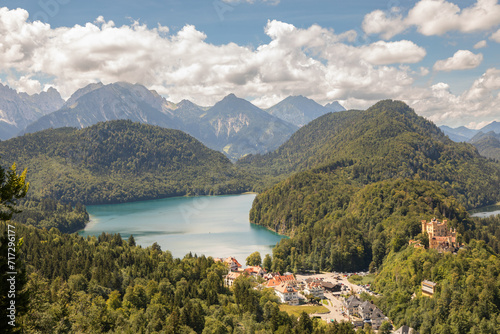 Panoramic View of Alpsee Lake Surrounded by Mountains and Forest in the Summer Near Hohenschwangau  Bavaria  Germany  