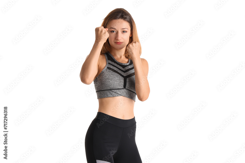 Young woman training on white background. Concept of self defense Young woman training on white background. Concept of self defense
