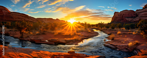 A panoramic view of a sunrise framed by the iconic Mesa Arch in Canyonlands National Park © MAJGraphics