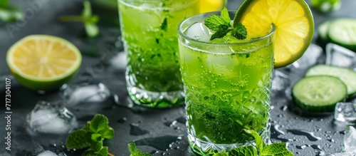 Non-alcoholic green citrus detox mocktail for St. Patrick's Day photo