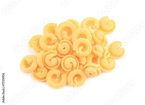 Pile of raw dischi volanti pasta isolated on white, top view