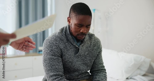 Black man, doctor and bed in support for news or diagnosis in appointment or checkup at hospital. Face of disappointed African male person or patient listening to nurse, illness or virus at clinic photo