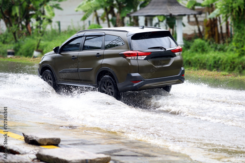 driving in puddles or flooded roads. driving risks aqua planing. driving in puddles or flooded roads. driving risks aqua planing.