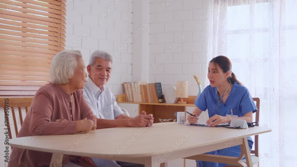 Asian caregiver nurse examine senior couple patient at home together. Asian caregiver nurse examine senior couple patient at home together.
