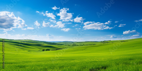Green grassy hills with blue sky and some clouds Summer landscape green hills and clouds.AI Generative