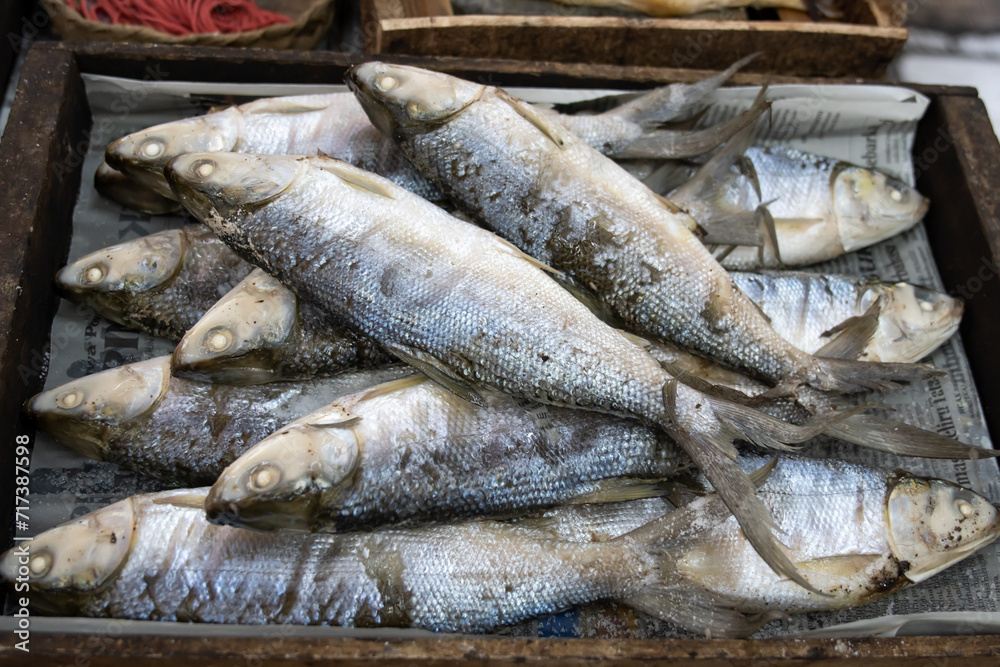 Dried milkfish being displayed in the traditional market.