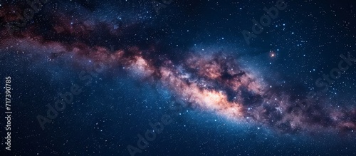Starry night sky with Milky Way and numerous stars.