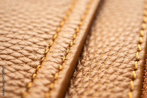 Obraz na płótnie luxury brown leather bag texture background with stitching