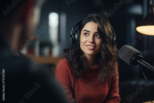 portrait of a woman thinking during the radio podcast show