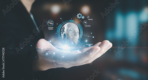 business man holding a mobile phone Showcasing technology from Artificial Intelligence, cutting-edge holographic graphics extend beyond the screen. Business data analysis assistant technology concept