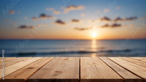 Empty wooden table on defocused blurred light sea background.