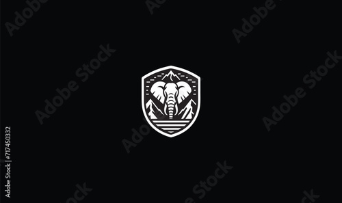 vector shield with elephant face mountain  river  logo badge  patch  label  sticker  design  art