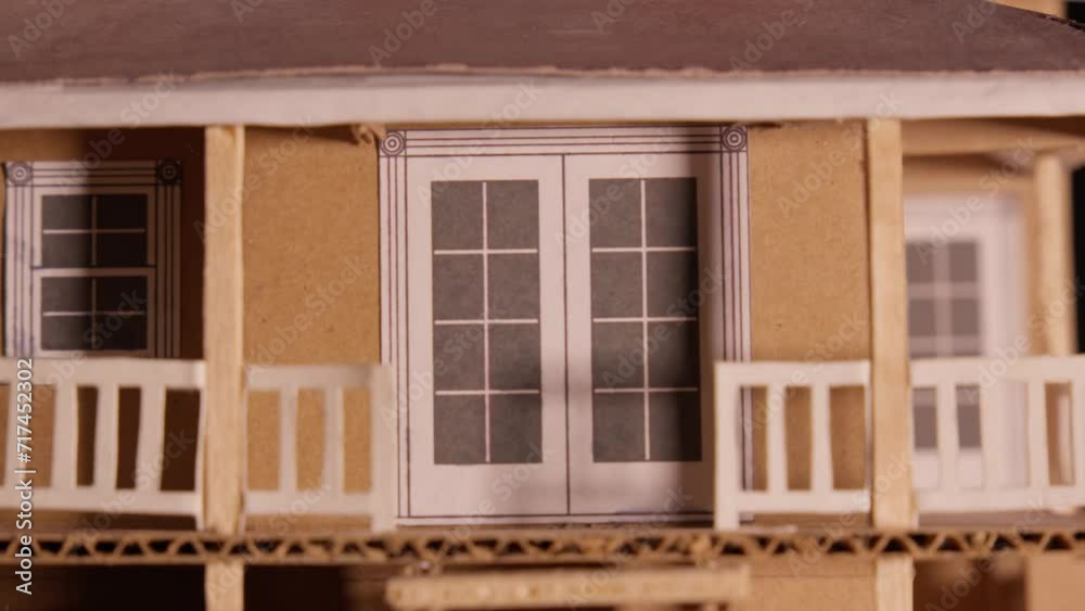 Light and shadow on cardboard maquette house dark background and lighting Light and shadow on cardboard maquette house dark background and lighting