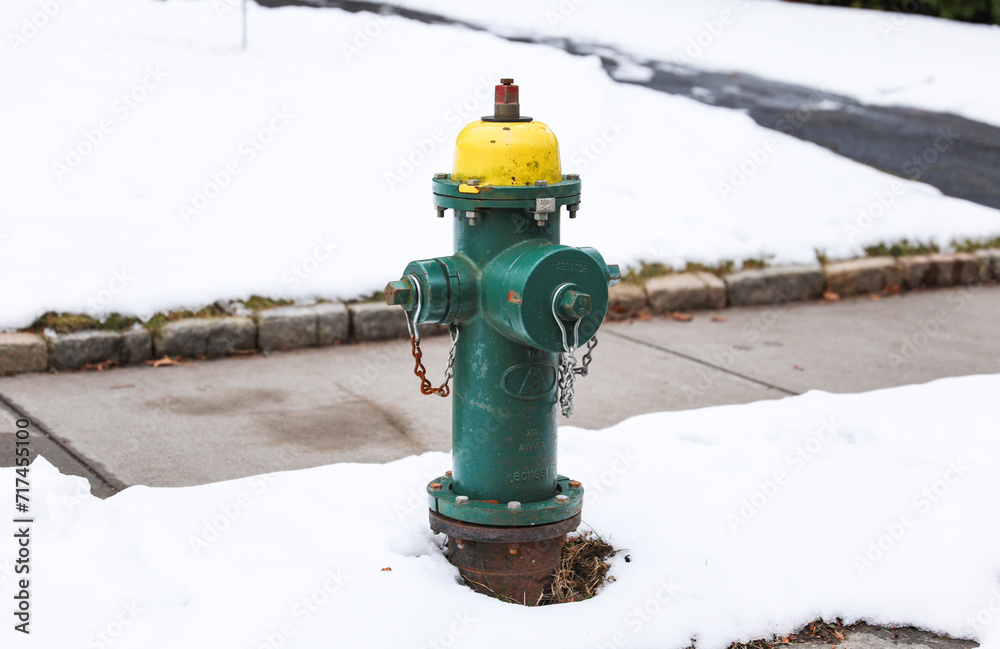 urban scene with a red fire hydrant standing tall on a sunlit street corner, symbolizing safety and preparedness