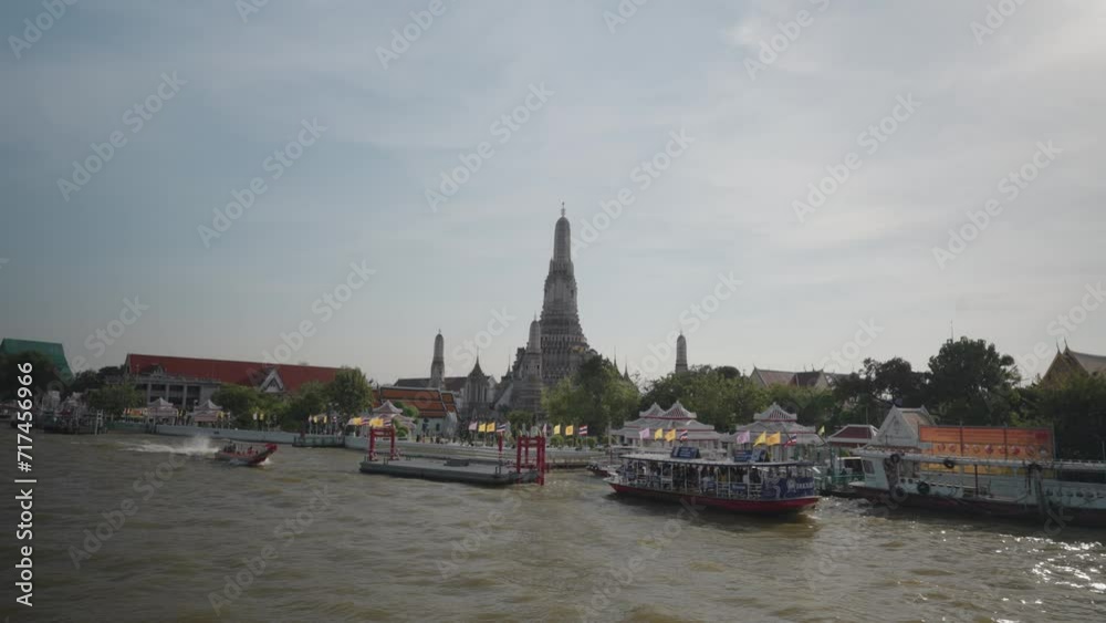 Wat Arun temple, view from cruise ship on Chao Phraya River, Bangkok, Thailand Wat Arun temple, view from cruise ship on Chao Phraya River, Bangkok, Thailand