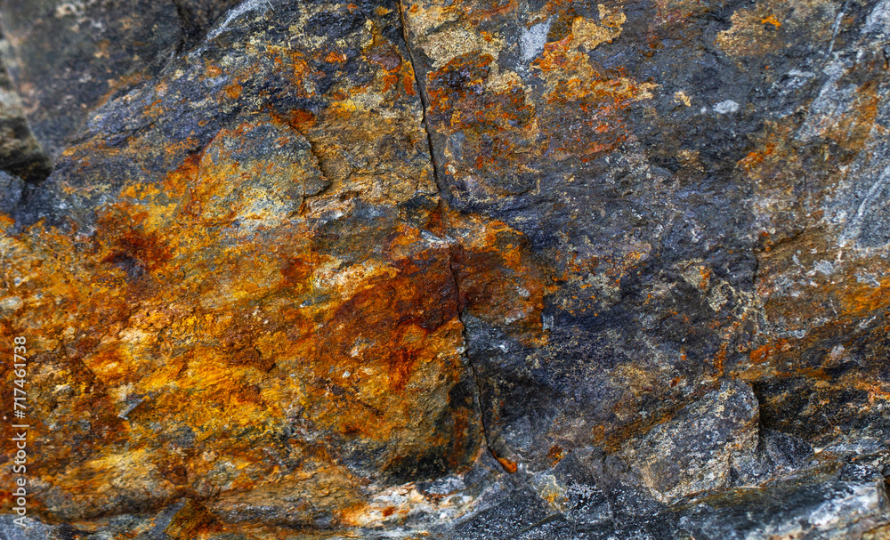 Orange rust background. Solid rock. Textured Orange rust background. Solid rock. Textured