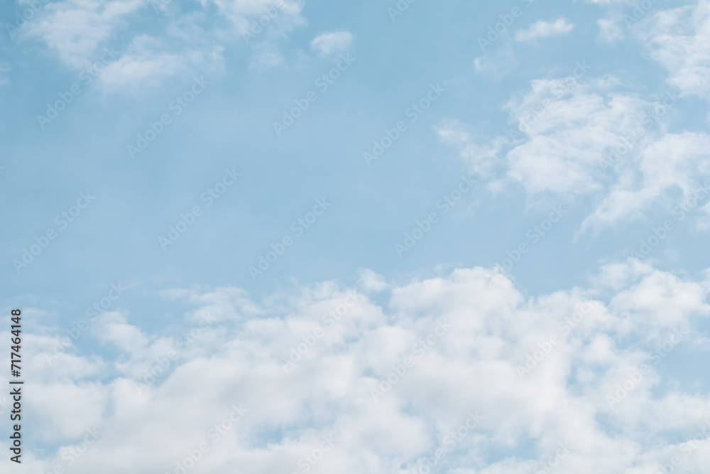 Fototapeta premium Background of blue sky with white clouds