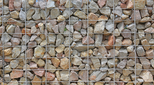 Stone wall with steel bar for background. photo