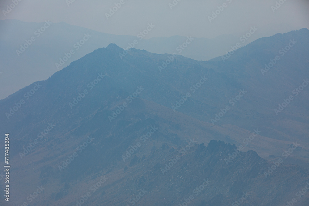 Mountains covered in smoke from severe wildfires