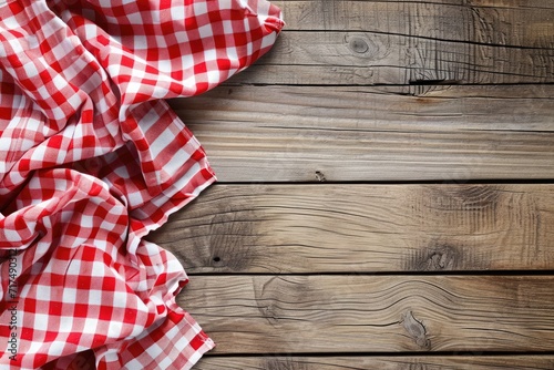 Wooden table with tablecloth as background