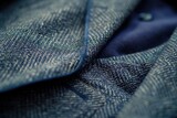 A close up of a suit jacket s detail