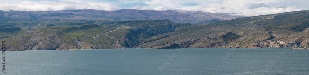 Panorama of the Chirkey reservoir on a September afternoon. Republic of Dagestan, Russia