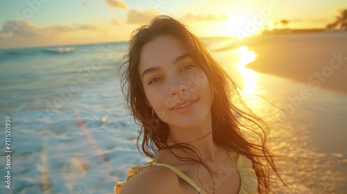 Young Woman Enjoying Sunset on the Beach