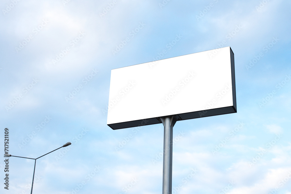 Outdoor billboard mockup on blue sky background Outdoor billboard mockup on blue sky background