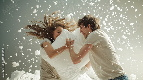 Whimsical scene of a couple having a playful pillow fight, capturing the fun and carefree side of love, Valentine's Day, pillow fight love, hd, whimsical with copy space photo