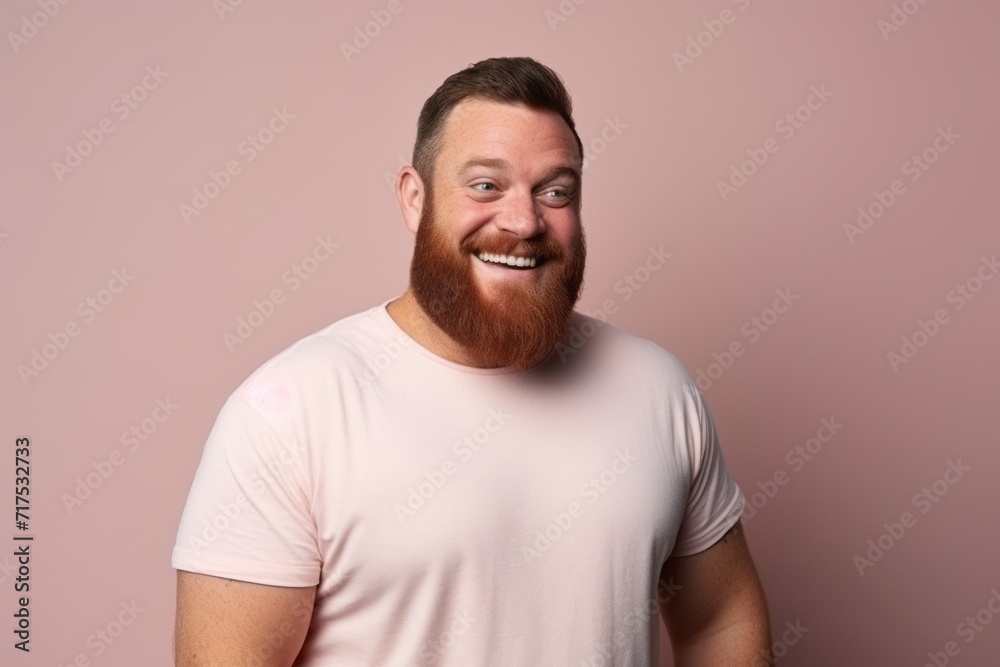 Portrait of a happy man with beard and mustache on pink background Portrait of a happy man with beard and mustache on pink background
