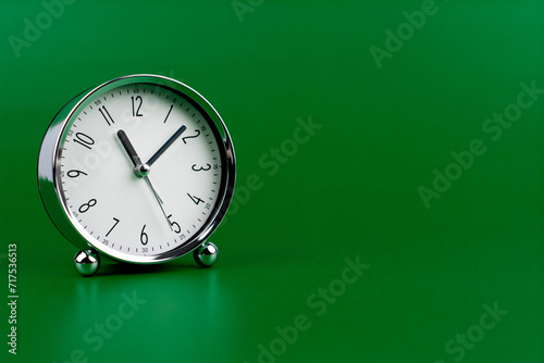 Time and work in daily life Photo of a modern clock in a high quality photo studio.