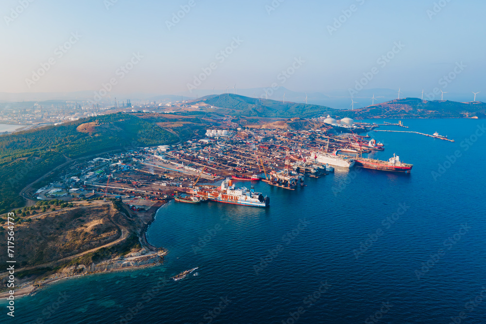 Ship breaking yard, demolition yard where old cargo ships, tankers in Turkey. Aerial view