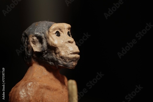 Fototapeta Naklejka Na Ścianę i Meble -  miniature figurine portrait of a primitive caveman