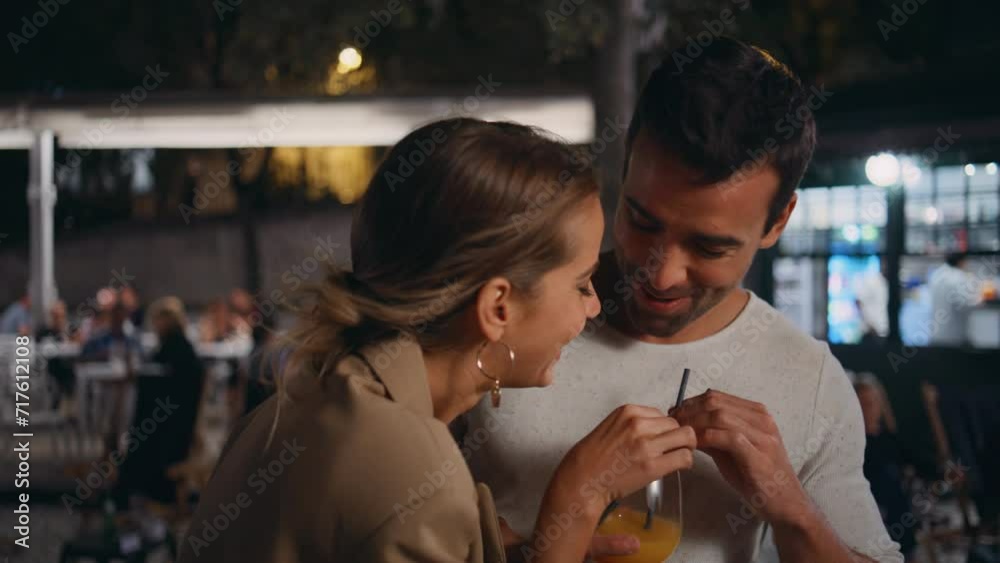 Happy pair tasting alcohol having fun on date closeup. Romantic partners drink Happy pair tasting alcohol having fun on date closeup. Romantic partners drink