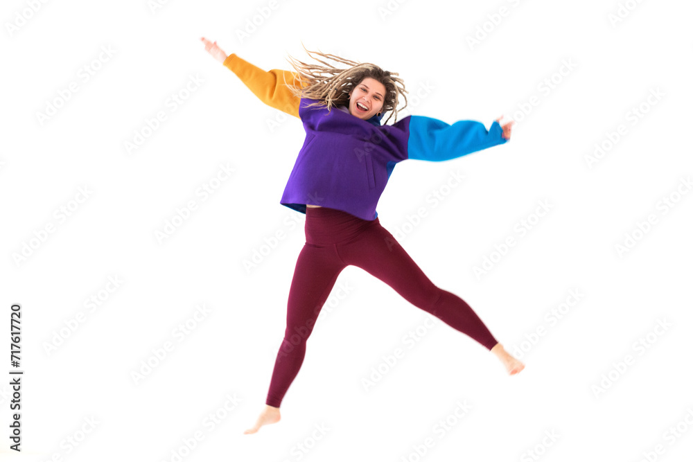 Happy woman shaking dreadlocks and smiling Happy woman shaking dreadlocks and smiling